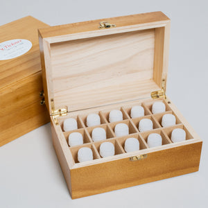 Small Homeopathic first aid kit with 15 remedies in a small wooden box with individual slots for each remedy